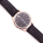 Ros&eacute;farbene Uhr mit schwarzem Armband